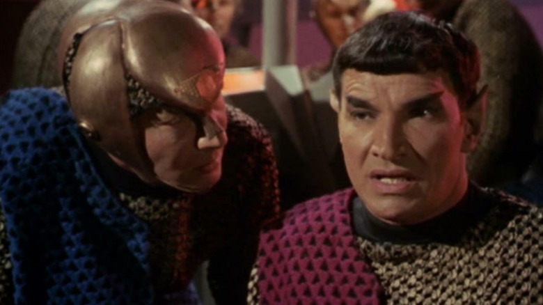The Romulan commander (Mark Lenard) speaks to an officer in Star Trek: The Original Series