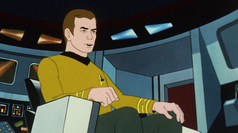 James Kirk (William Shatner) sits in the Enterprise captain's chair in Star Trek: The Animated Series