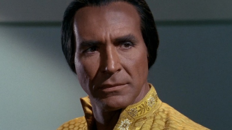 Khan Noonien Singh (Ricardo Montalbán) stands inquisitively in Star Trek: The Original Series