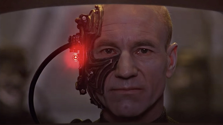 An assimilated Jean-Luc Picard (Patrick Stewart) appears on the Enterprise viewscreen in Star Trek: The Next Generation
