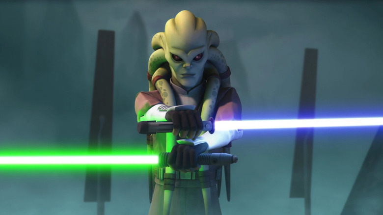 Kit Fisto (Phil LaMarr) wields blue and green lightsabers in a foggy landscape in Star Wars: The Clone Wars