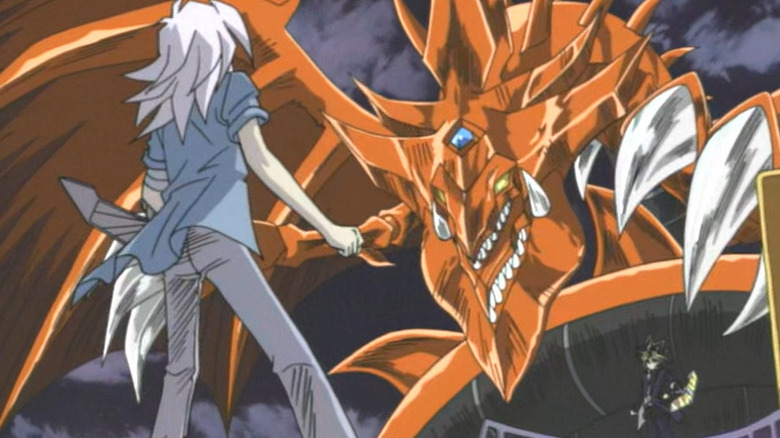 Yugi using Slifer the Sky Dragon to battle Bakura in Yu-Gi-Oh!