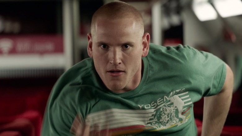 Spencer Stone as himself charges down an aisle in The 15:17 to Paris