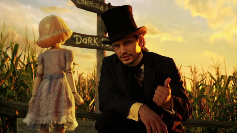 James Franco as Oscar Zoroaster Phadrig Isaac Norman Henkle Emmannuel Ambroise Diggs talks to a porcelain doll in Oz the Great and Powerful