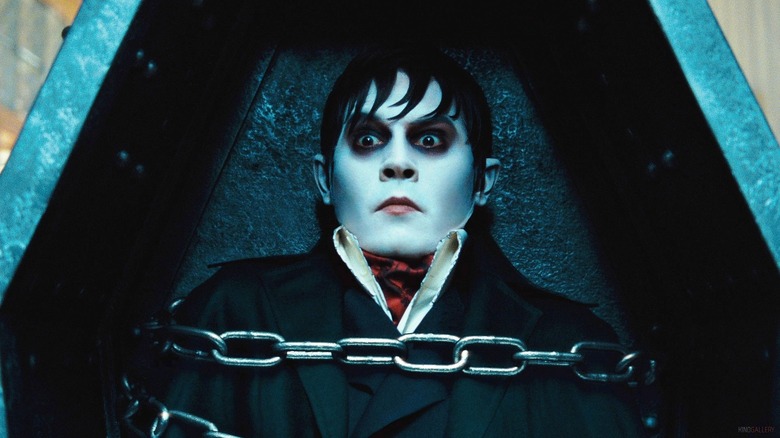 Johnny Depp as Barnabas Collins lies in a coffin in Dark Shadows