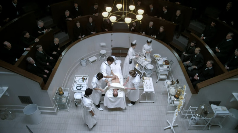Dr. Thackery (Clive Owen) prepares for surgery in operating theater in The Knick