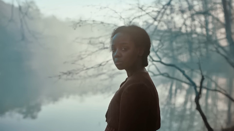 Cora (Thuso Mbedu) turning to camera in The Underground Railroad