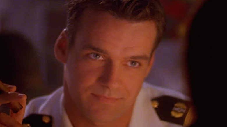 Harmon Rabb Jr. (David James Elliott) stares someone down on JAG