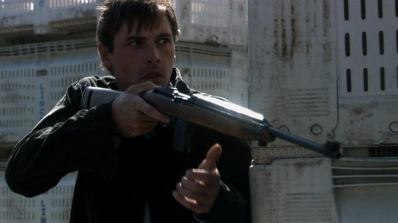 Jake Green (Skeet Ulrich) threatens with a gun on Jericho