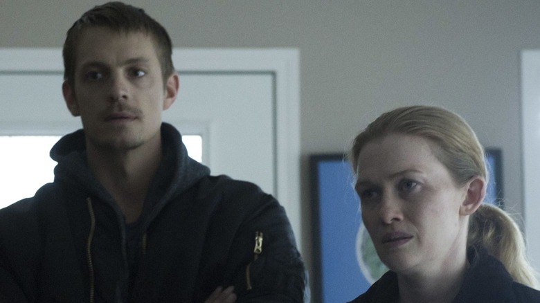 Detectives Stephen Holder (Joel Kinnaman) and Sarah Linden (Mireille Enos) investigate intensely on The Killing
