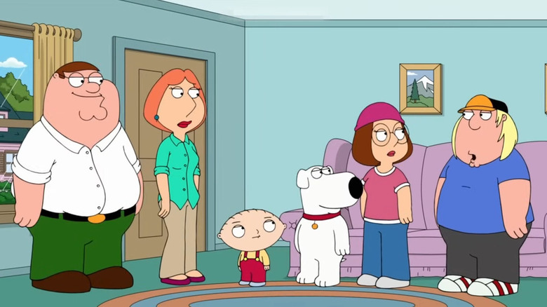The Griffins standing in their living room in Family Guy