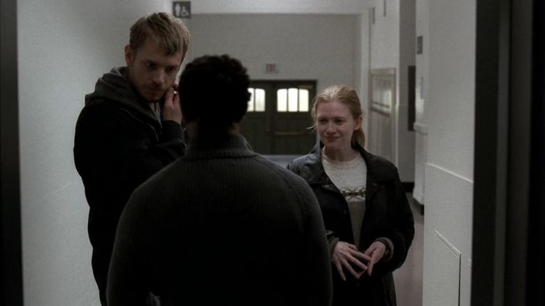 Stephen Holden (Joel Kinnaman) and Sarah Linden (Mireille Enos) conducting investigation in The Killing