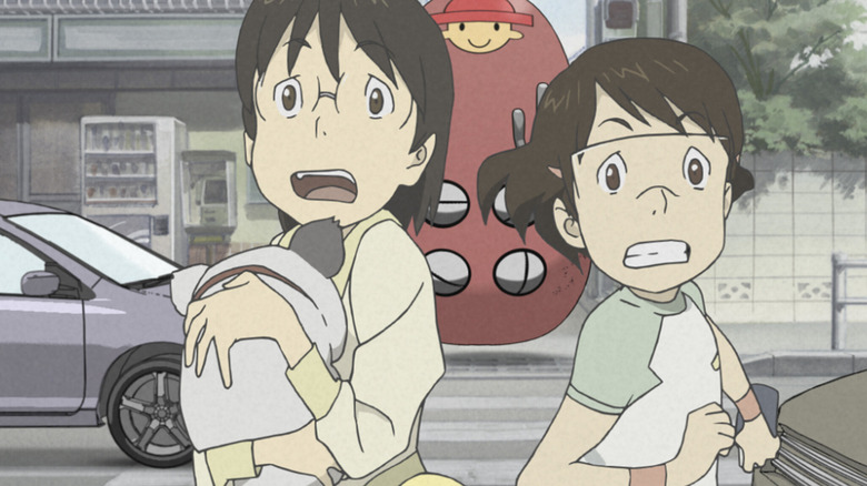 Yuko Okonogi and Fumie Hashimoto flee from a digital avatar in Den-noh Coil