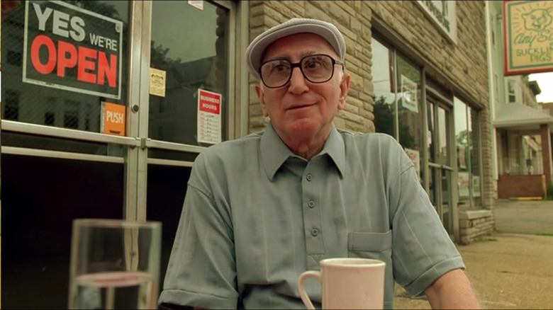 Uncle Junior has a coffee