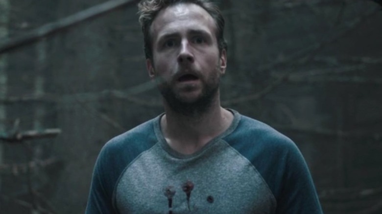 Rafe Spall looking terrified