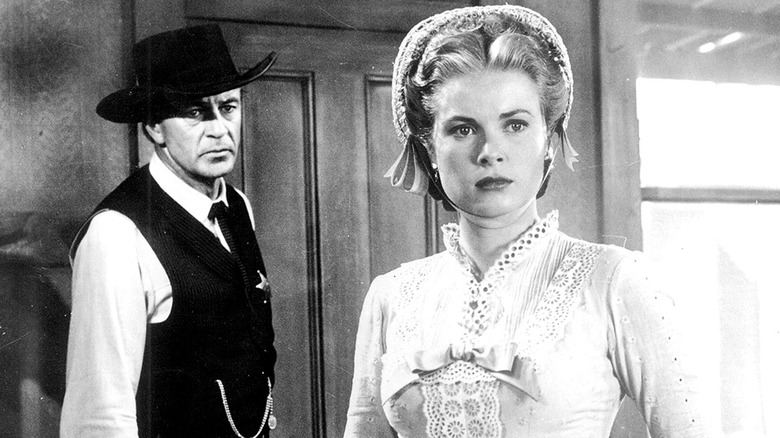Will Kane (Gary Cooper) glances at Amy Fowler (Grace Kelly) in High Noon