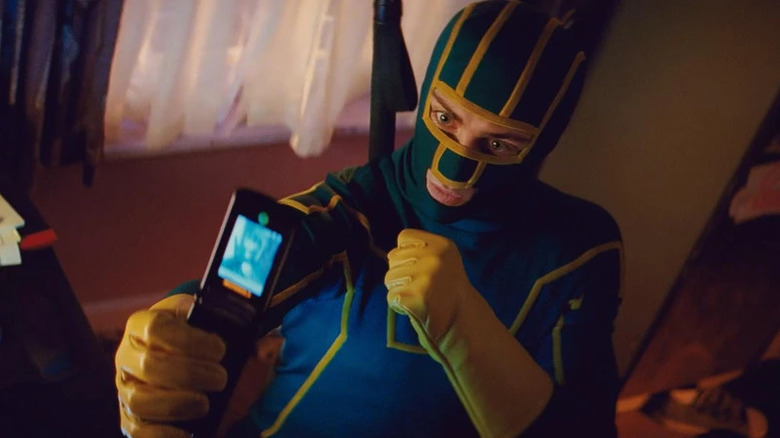 Aaron Taylor-Johnson as Kick-Ass taking a selfie of himself in Kick-Ass