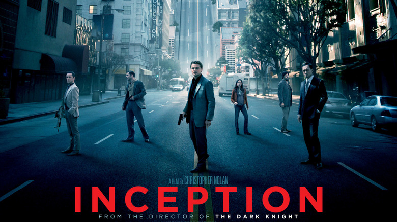Arthur, Emes, Cobb, Ariadne, Yusuf, and Saito on the street on the poster for Inception