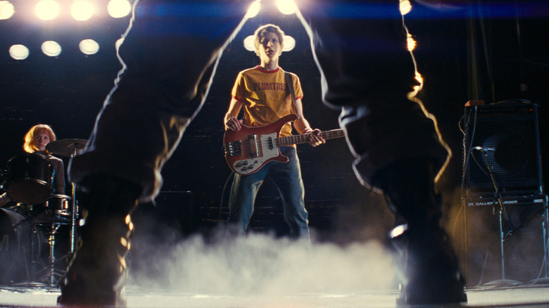 Michael Cera as Scott Pilgrim with his bass getting ready for battle in Scott Pilgrim vs. the World