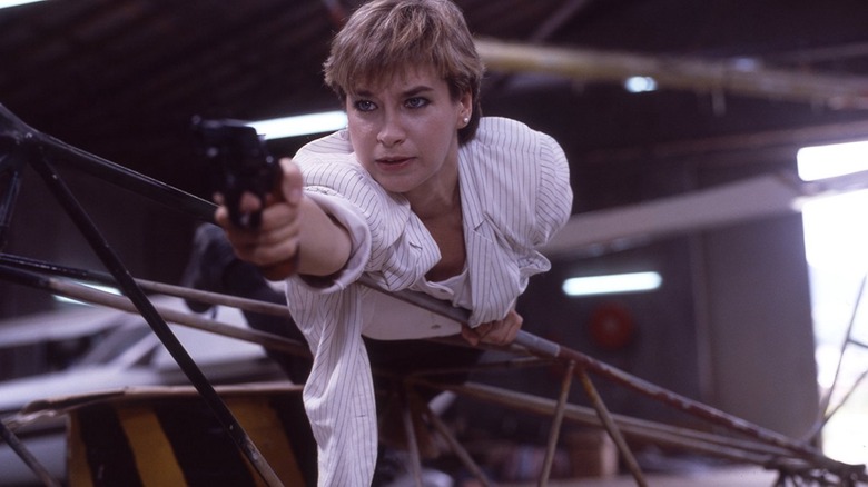 Cynthia Rothrock drawing her service revolver