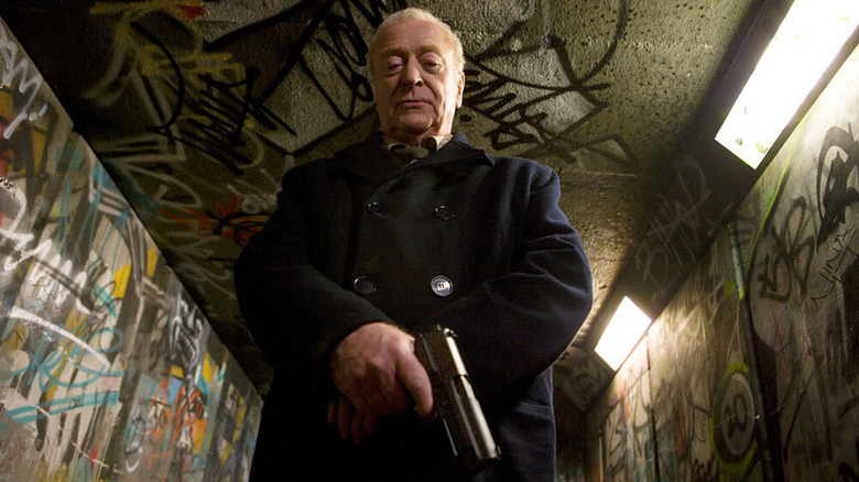 Michael Caine holding gun
