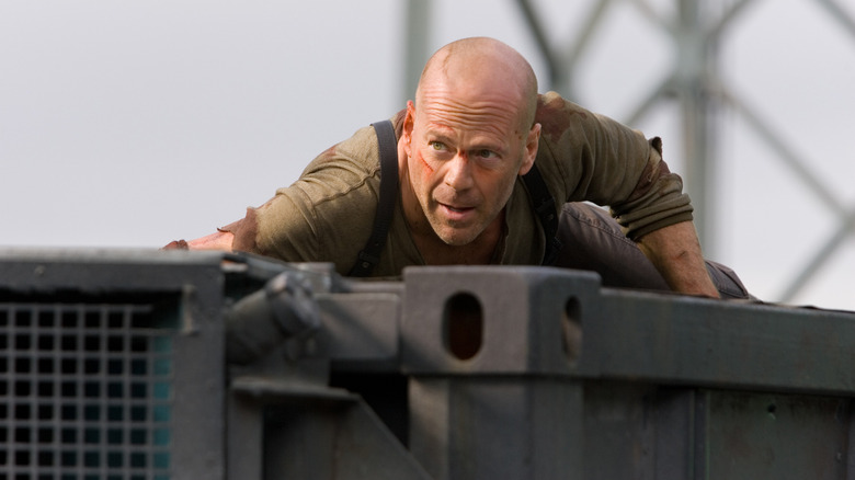 Bruce Willis ducking