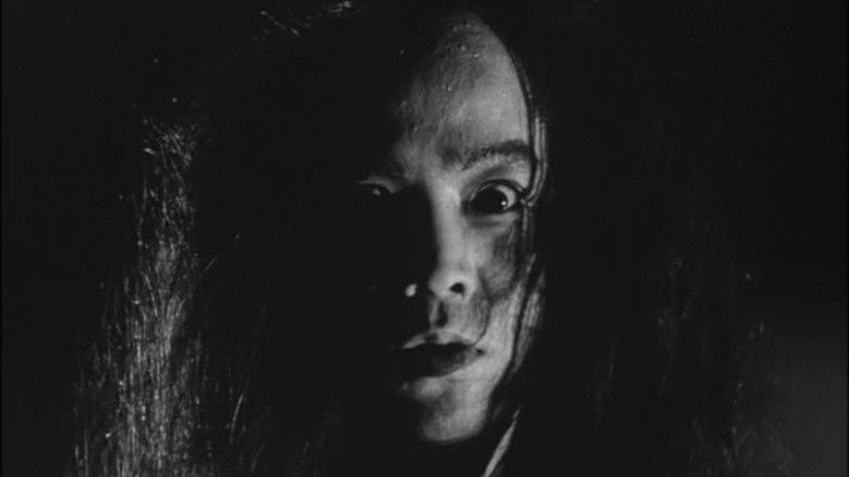 Phantasmagoric face in the dark
