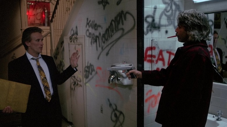 Sam Ellliott quickdraws on Peter Weller