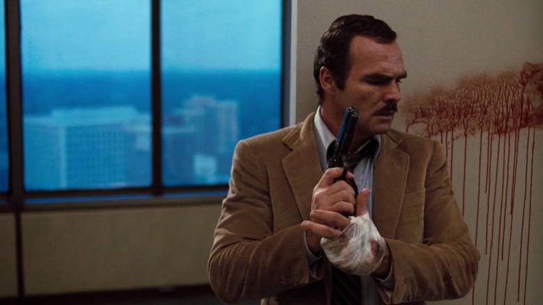 Burt Reynolds following a blood trail