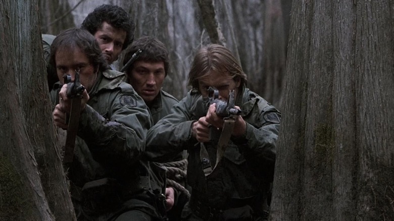 Powers Boothe and Keith Carradine hiding among the trees