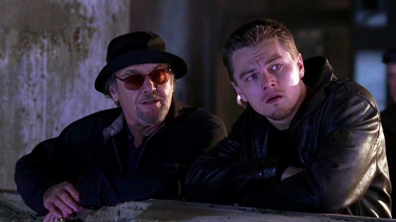 Frank Costello (Jack Nicholson) speaks to Billy Costigan (Leonardo DiCaprio) in a darkened building in The Departed