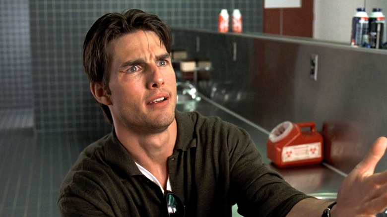 Jerry Maguire (Tom Cruise) begs for help in the bathroom in Jerry Maguire