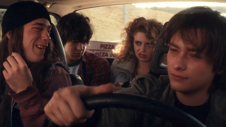 Hawk, Trip, Lex, and Christine (Edward Furlong, James DeBello, Giuseppe Andrews, and Natasha Lyonne) in a car on the way to a KISS concert in Detroit Rock City