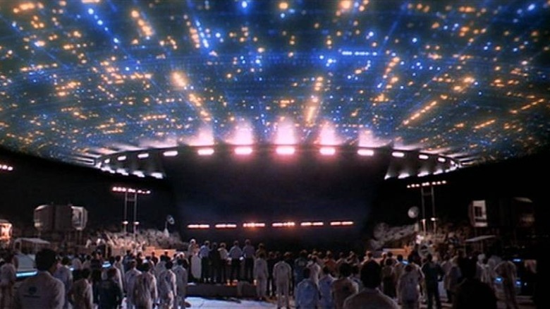 Humans gazing at alien spaceship in Close Encounters of the Third Kind