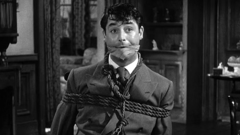 Cary Grant as Mortimer Brewster tied up in Arsenic and Old Lace