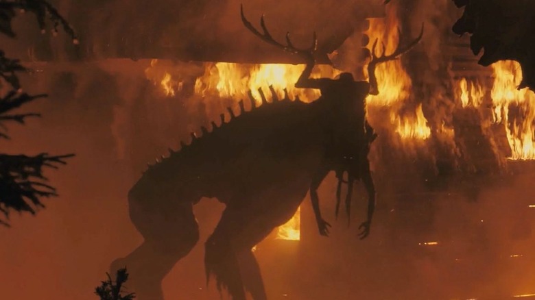 Moder, the patron of the cult in the Rtiual, is an upsetting, elk-like figure shadowed against flame
