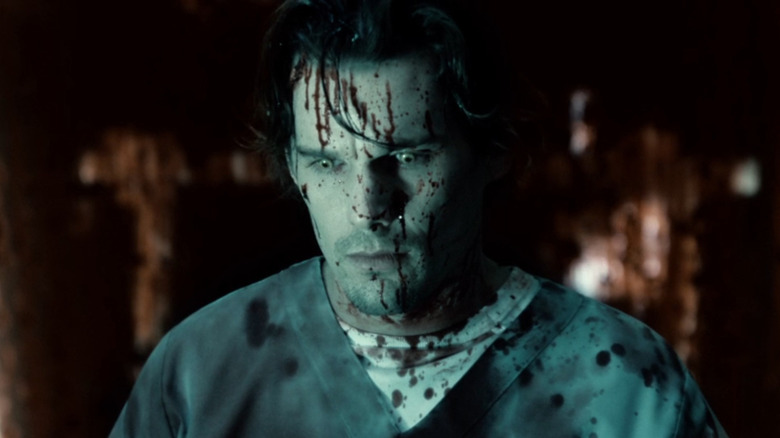 Edward (Ethan Hawke) horrified and covered in blood in Daybreakers