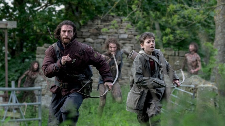 Aaron Taylor-Johnson and Alfie Williams as father and son survivors in 28 Years Later