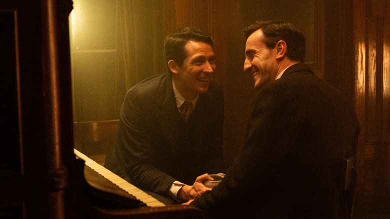 David and Lionel laughing at a piano in The History of Sound