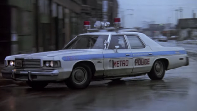 A Metro Police squad car driving on a street in the opening credits of Hill Street Blues