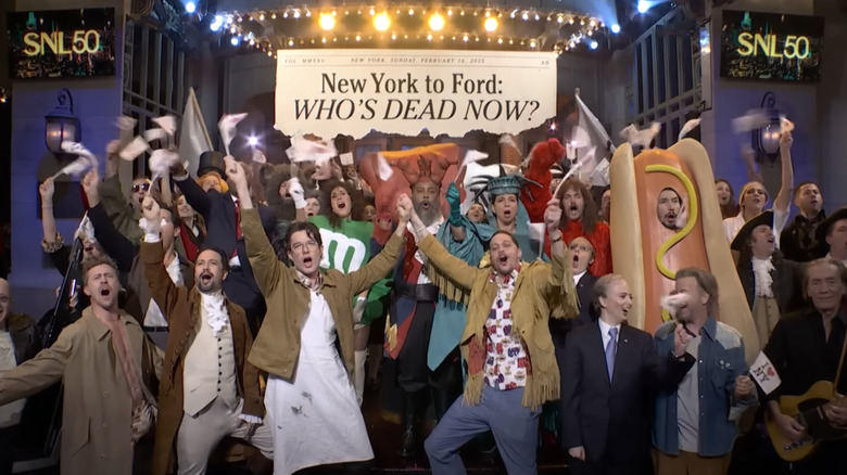 An ensemble of Saturday Night Live cast members and guest stars in a New York musical sketch during SNL 50