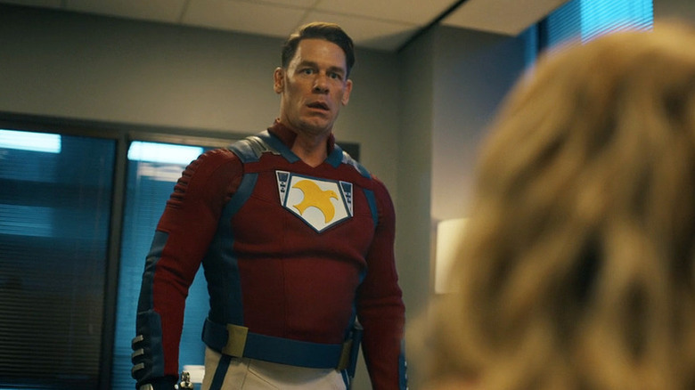 Chris Smith (John Cena) stares down in shock in Peacemaker