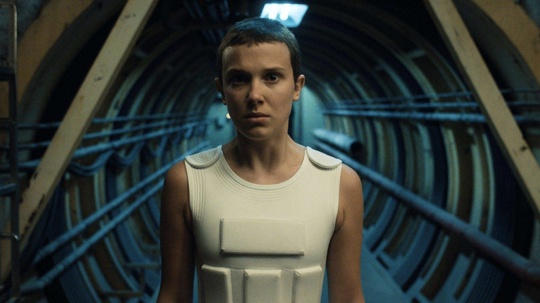 Eleven (Millie Bobby Brown) in the basement of Hawkins Power and Light in Stranger Things