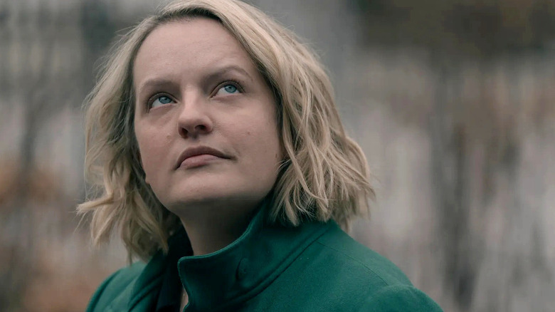 June Osborne (Elisabeth Moss) stares up wistfully in The Handmaid's Tale
