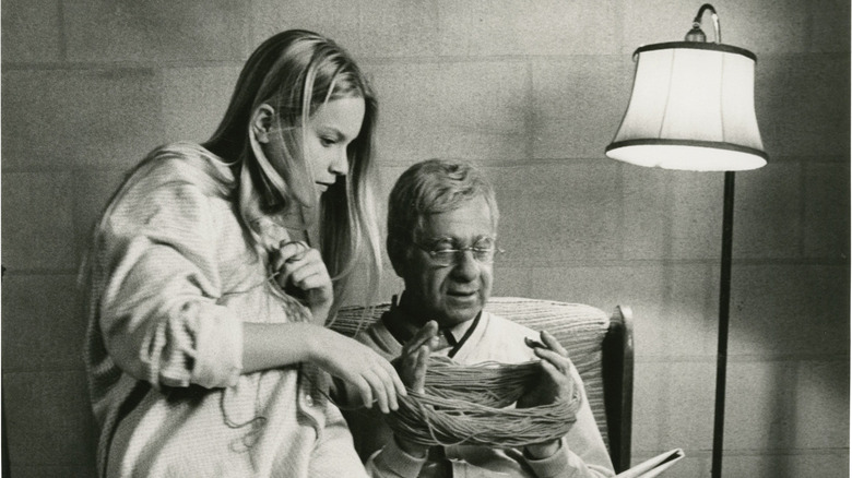Walter Matthau plays with girl