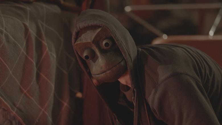 masked man in I See You