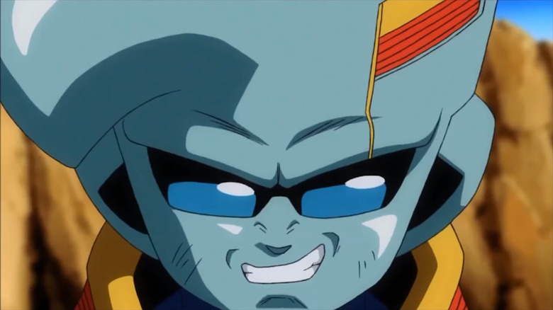 Baby grins viciously with slight scuff marks on his face in Dragon Ball GT