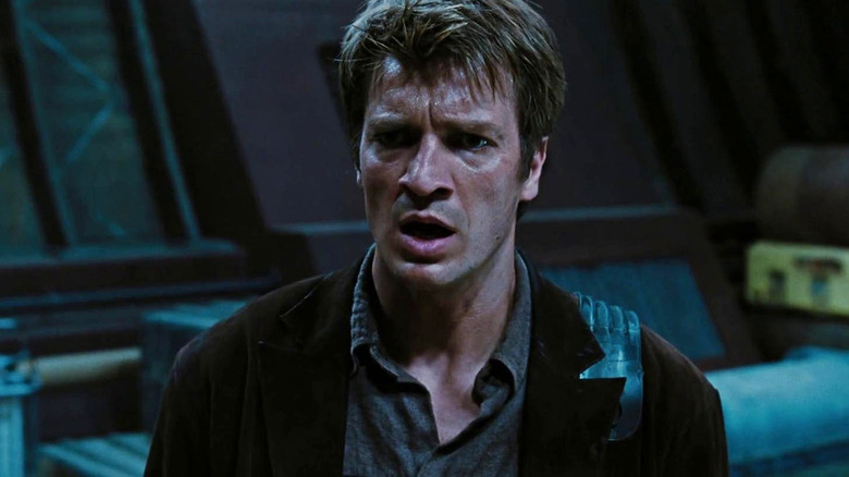Nathan Fillion as Mal Reynolds with his mouth agape in Serenity