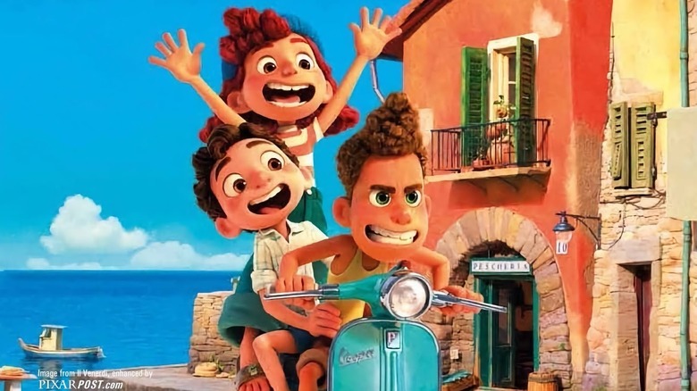 Alberto and Luca ride a vespa together