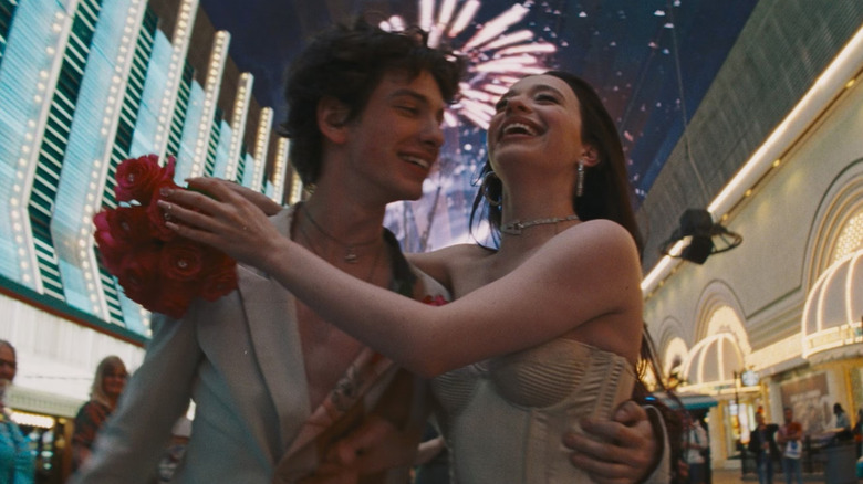 Mikey Madison as Anora with Mark Eydelshteyn as Ivan in Las Vegas in Anora